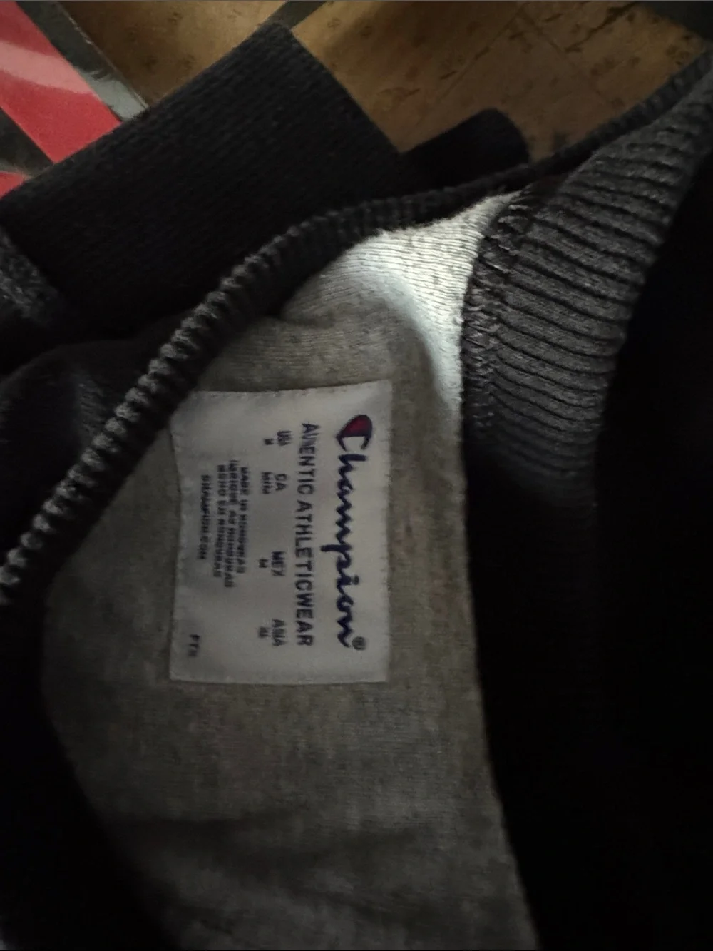 Champion Black Crewneck with White Script and Red Logo Accent